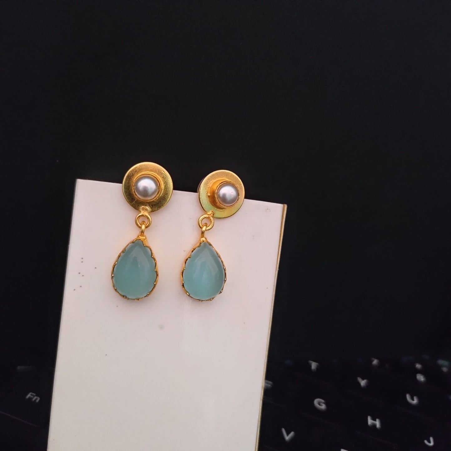 Golden drop stone with pearl stud earring