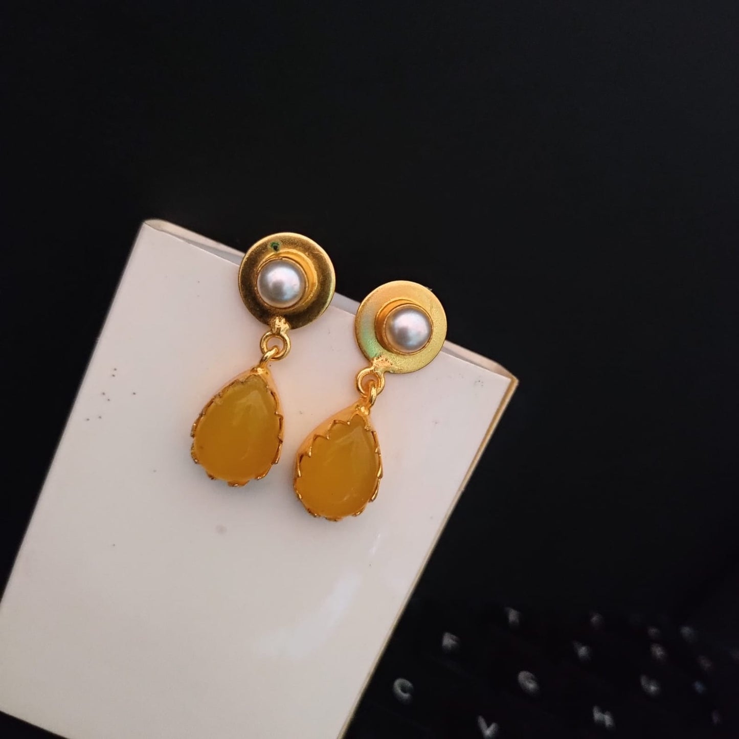 Golden drop stone with pearl stud earring