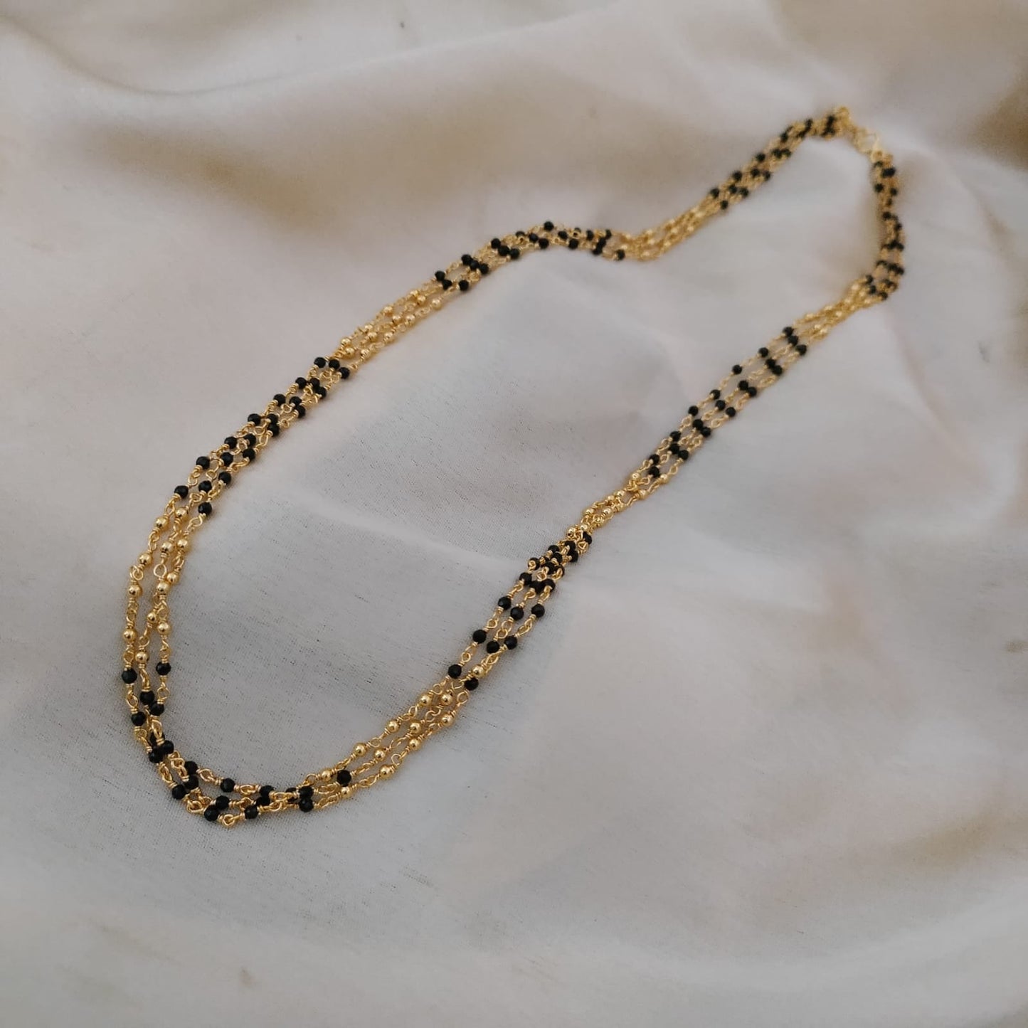 3 line golden with black beaded long chain