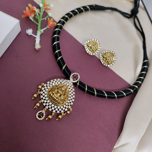 Lakshmi white stone black thread necklace