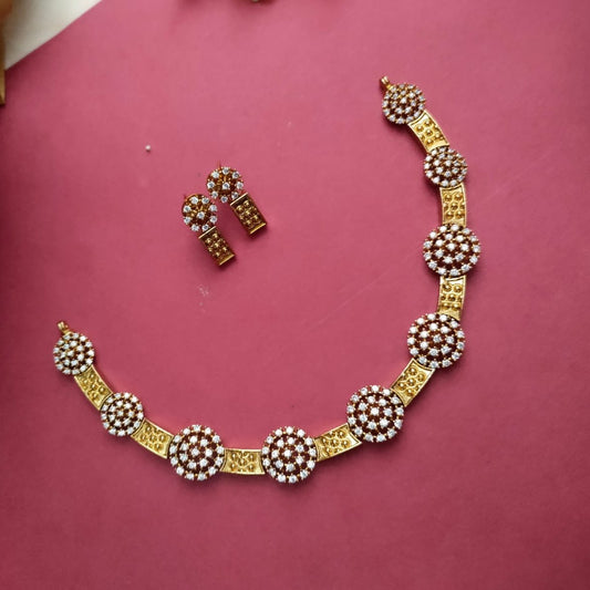 Necklace set, adigai type with round white stone studded pattern around the neck