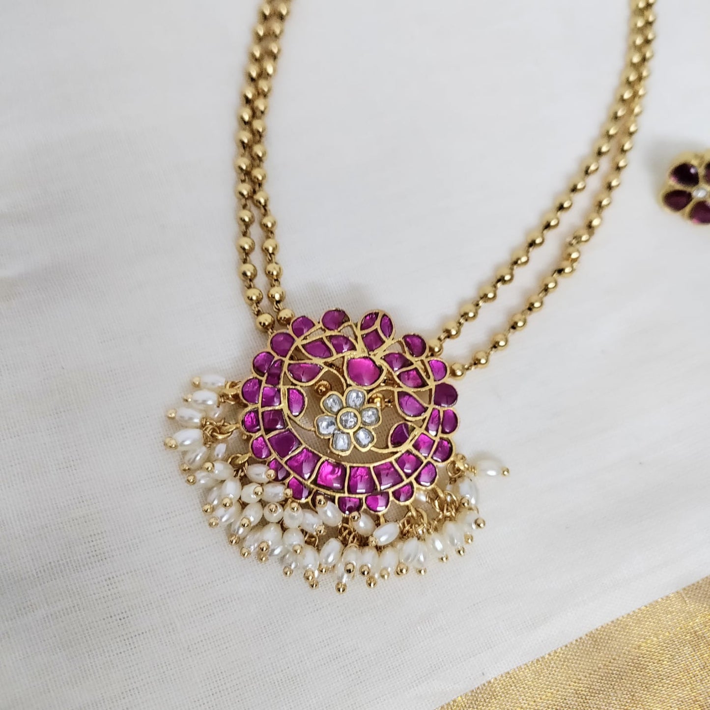 Round jadau stone pendant golden long chain set