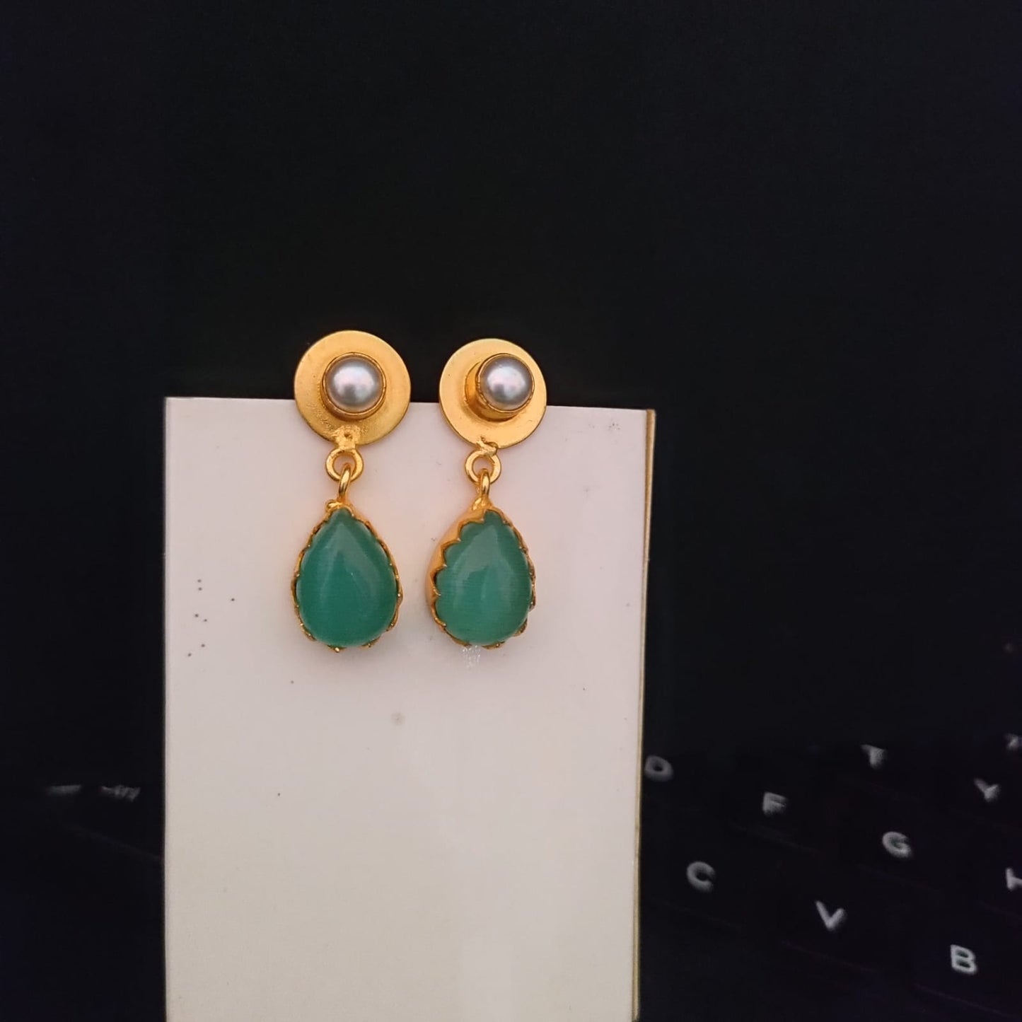 Golden drop stone with pearl stud earring