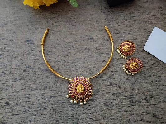 Lakshmi with kemp stone studded pendant hasuli set