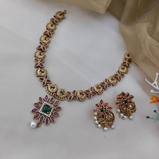 Floral ruby with green stone necklace