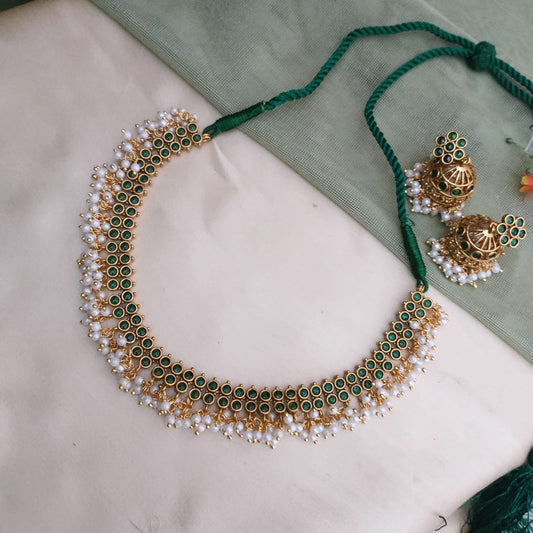 Timeless design, two layered emerald stone studded necklace with jumki